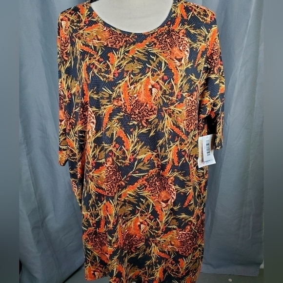LuLaRoe Tops - NWT Lularoe Irma, brown/black leopard faces on black base, size L